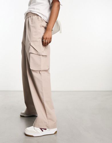 Pantaloni color sabbia con tasche - ASOS DESIGN - Modalova