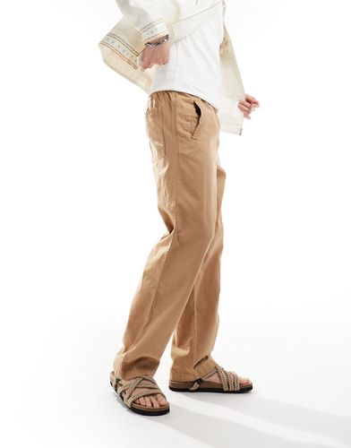 Pantaloni comodi in lino color cuoio slavato - ASOS DESIGN - Modalova