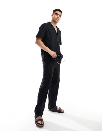 Pantaloni comodi neri in pizzo con vita elasticizzata in coordinato - ASOS DESIGN - Modalova