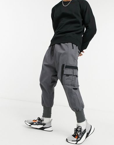 Pantaloni con cavallo basso tasca MA1 e fondo elasticizzato - ASOS DESIGN - Modalova