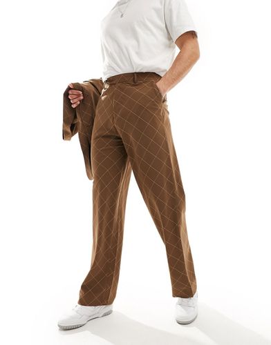 Pantaloni da abito marroni a quadri a fondo ampio con taglio sbieco - ASOS DESIGN - Modalova