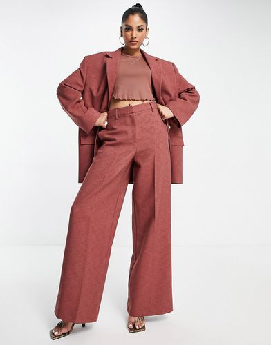 Pantaloni da abito con fondo ampio color castagna - ASOS DESIGN - Modalova
