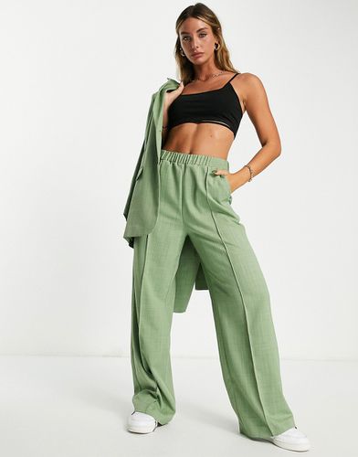 Pantaloni da abito verdi con vita elasticizzata - ASOS DESIGN - Modalova