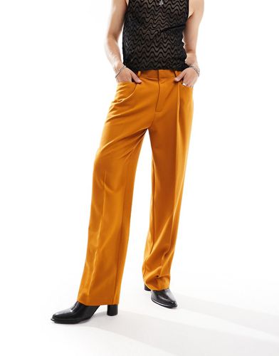 Pantaloni eleganti a fondo ampio bruciato con tasche frontali - ASOS DESIGN - Modalova