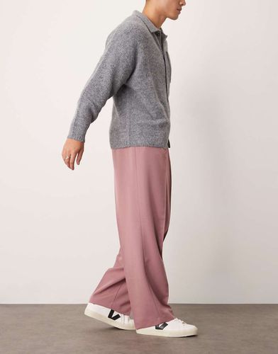 Pantaloni eleganti a fondo ampio polvere con pieghe sul davanti - ASOS DESIGN - Modalova