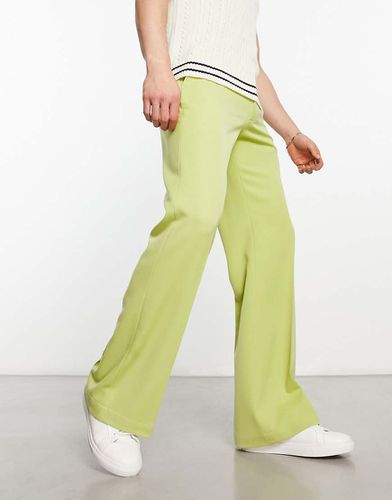 Pantaloni eleganti a zampa lime - ASOS DESIGN - Modalova