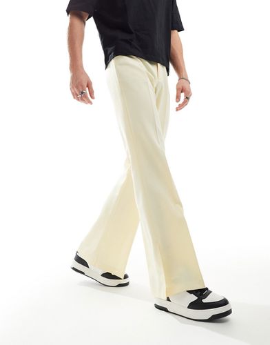 Pantaloni eleganti a zampa vintage gialli con spacco laterale - ASOS DESIGN - Modalova