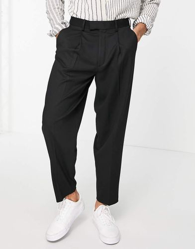 Pantaloni eleganti affusolati oversize neri - ASOS DESIGN - Modalova