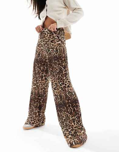 Pantaloni plissé a fondo ampio con stampa leopardata - ASOS DESIGN - Modalova