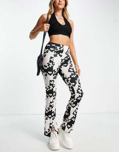 Pantaloni skinny bianchi e neri a fiori stile anni '60 - ASOS DESIGN - Modalova