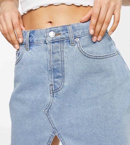 ASOS DESIGN Petite - Minigonna in denim "original" lavaggio medio - ASOS Petite - Modalova