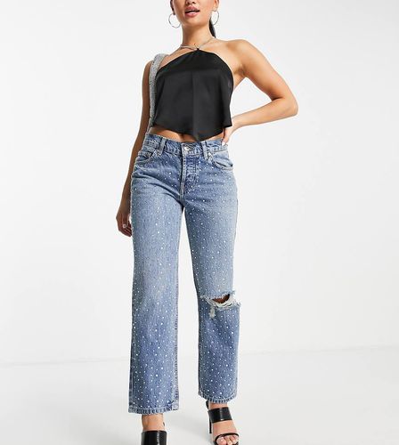 ASOS DESIGN Petite - Jeans dritti a vita bassa in misto cotone con strass applicati a caldo e strappi sulle ginocchia - MBLUE - ASOS Petite - Modalova