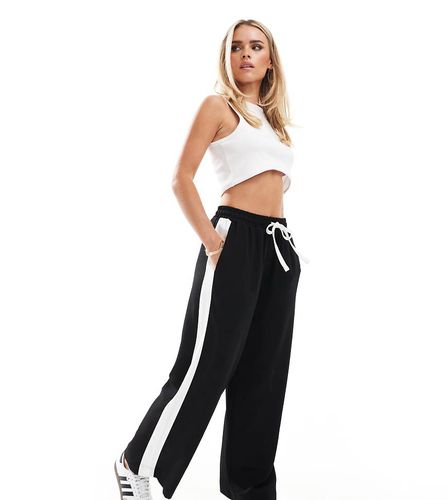 ASOS DESIGN Petite - Pantaloni neri con pannello a contrasto - ASOS Petite - Modalova