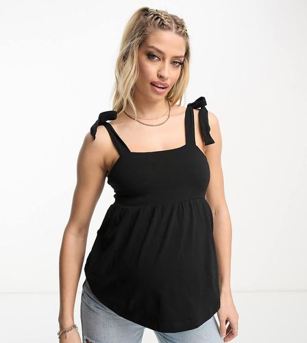 ASOS DESIGN Premaman - Top estivo nero con peplo e spalline allacciate - ASOS Maternity - Modalova