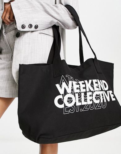 ASOS DESIGN - Weekend Collective - Borsa shopping nera con grafica doppia - ASOS WEEKEND COLLECTIVE - Modalova
