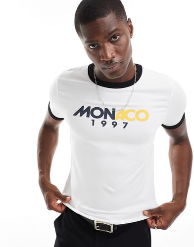 T-shirt attillata bianca con bordi a contrasto e stampa Monaco - ASOS DESIGN - Modalova