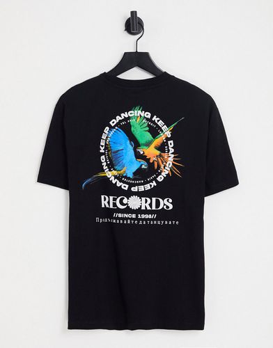 T-shirt comoda nera con stampa "Birds of Paradise" sul davanti e sul retro - ASOS DESIGN - Modalova