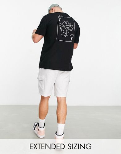 T-shirt comoda nera con stampa di carta da gioco con cherubino sul retro - ASOS DESIGN - Modalova