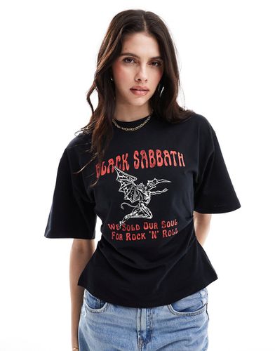 T-shirt con vita a corsetto nera con stampa su licenza dei Black Sabbath - ASOS DESIGN - Modalova