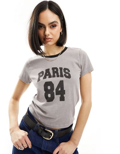 T-shirt mini slavato con stampa Paris 84 - ASOS DESIGN - Modalova
