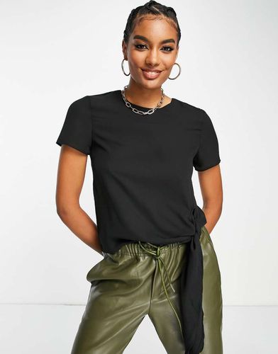 T-shirt nera con nodo allacciato - ASOS DESIGN - Modalova