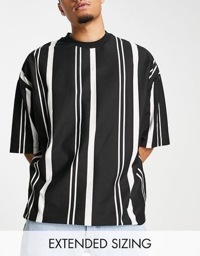 T-shirt oversize a righe verticali nere ed écru - ASOS DESIGN - Modalova