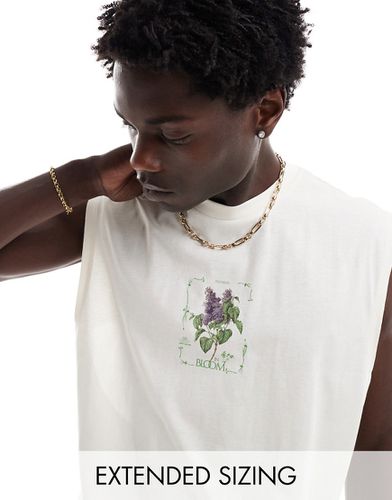 T-shirt oversize sporco con stampa a fiori sul petto - ASOS DESIGN - Modalova