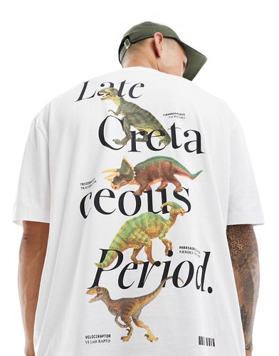 T-shirt oversize bianca con stampa di dinosauri sul retro - ASOS DESIGN - Modalova