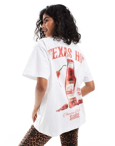 T-shirt oversize bianca con stampa grafica "Texas Hot" - ASOS DESIGN - Modalova