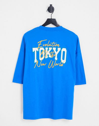 T-shirt oversize con stampa della città di Tokyo sul retro - ASOS DESIGN - Modalova
