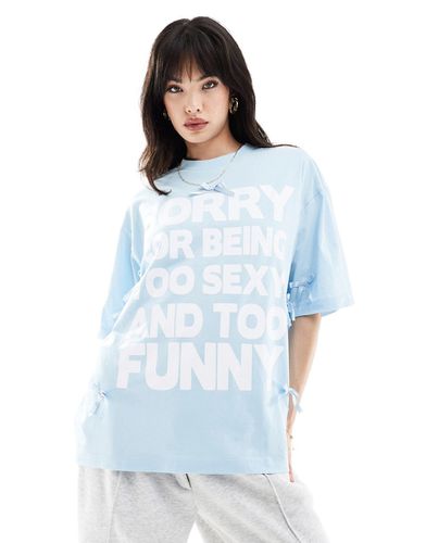 T-shirt oversize con scritta "Sorry" e fiocchi - ASOS DESIGN - Modalova