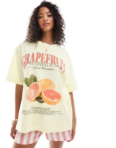 T-shirt oversize gialla con stampa di pompelmo - ASOS DESIGN - Modalova