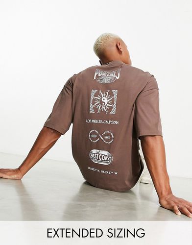 T-shirt oversize marrone con stampa celestiale sul petto e sulla schiena - ASOS DESIGN - Modalova