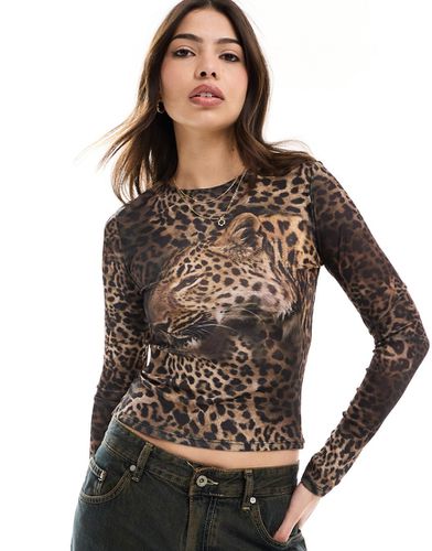 T-shirt ristretta in rete a maniche lunghe con stampa di leopardo - ASOS DESIGN - Modalova