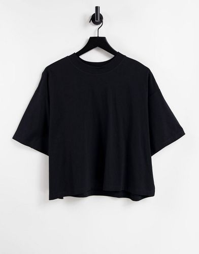 T-shirt super oversize nera con spacchi laterali - ASOS DESIGN - Modalova