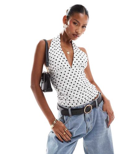 Top allacciato al collo a pois - ASOS DESIGN - Modalova