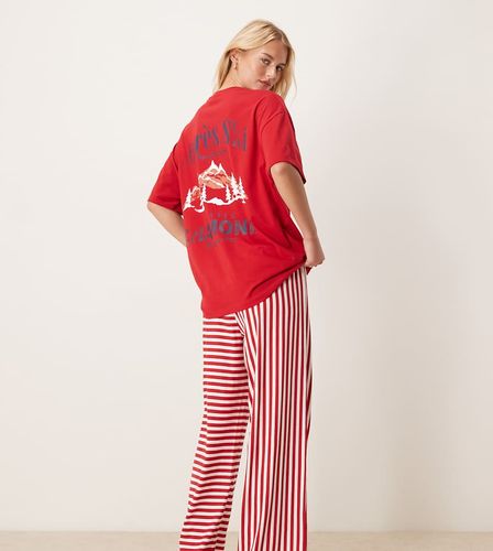 ASOS DESIGN Tall - Ensemble de pyjama avec pantalon ample et t-shirt oversize à imprimé Après-ski - Asos Tall - Modalova