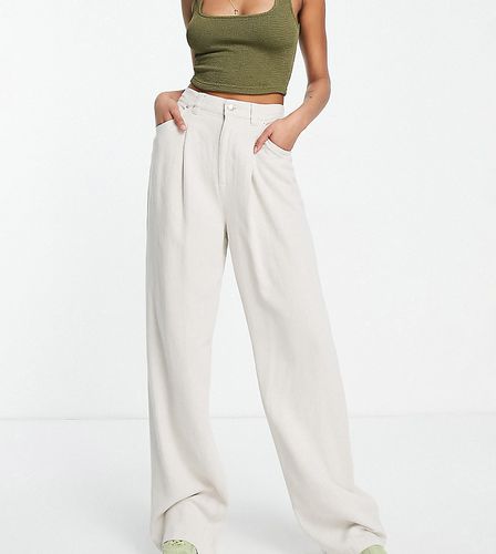 Tall - Pantaloni in misto lino a fondo ampio color avena - ASOS DESIGN - Modalova