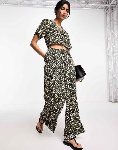 Tuta jumpsuit 2 in 1 a fiori gialli - ASOS DESIGN - Modalova