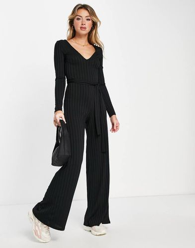 Tuta jumpsuit con fondo ampio in jersey a coste - ASOS DESIGN - Modalova