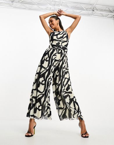 Tuta jumpsuit culotte a pieghe con cintura e stampa astratta color bianco e nero - ASOS DESIGN - Modalova
