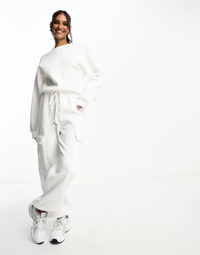 Tuta jumpsuit felpata oversize crema con tasche - ASOS DESIGN - Modalova