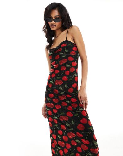Vestito con gonna al polpaccio in rete con cut-out sul busto nero e rosso con stampa di ciliegie - ASOS DESIGN - Modalova