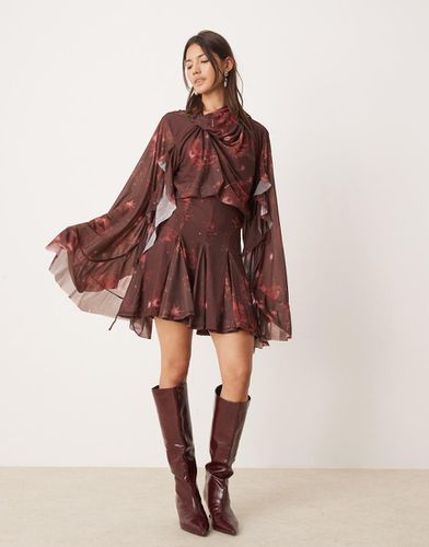 Vestito corto bordeaux con stampa a tema cosmico, scollo ad anello asimmetrico sul retro e volant - ASOS DESIGN - Modalova