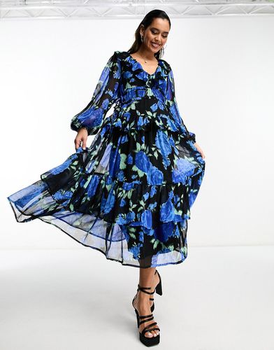 Vestito lungo a balze con volant e stampa a fiori blu su fondo nero - ASOS DESIGN - Modalova