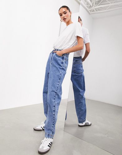 Jeans classici affusolati lavaggio medio - ASOS EDITION - Modalova