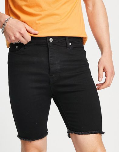 Pantaloncini di jeans slim con fondo grezzo slavato - Bolongaro Trevor - Modalova