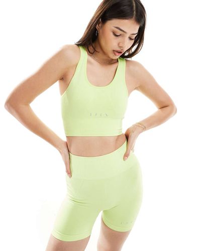 Urdhva - Reggiseno sportivo senza cuciture lime con imbottitura rimovibile - Born Living Yoga - Modalova