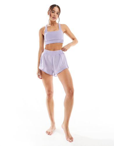 Padma - Pantaloncini con shorts incorporati beige - Born Living Yoga - Modalova