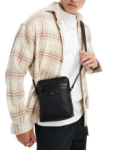 BOSS - Trystan - Borsa a tracolla nera con stampa di monogrammi - BOSS by Hugo Boss - Modalova